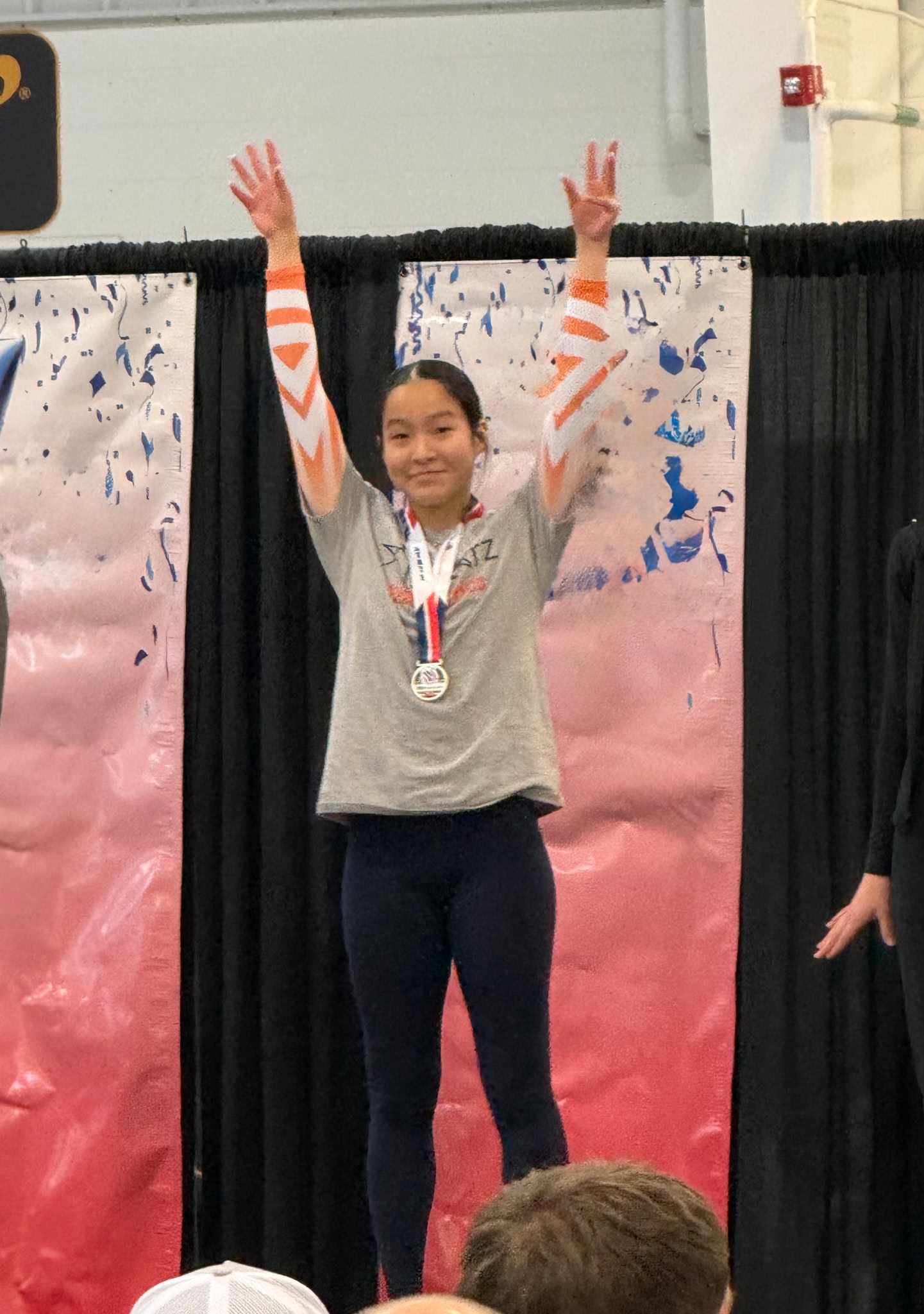 All Starz gymnasts celebrating a first-place team finish