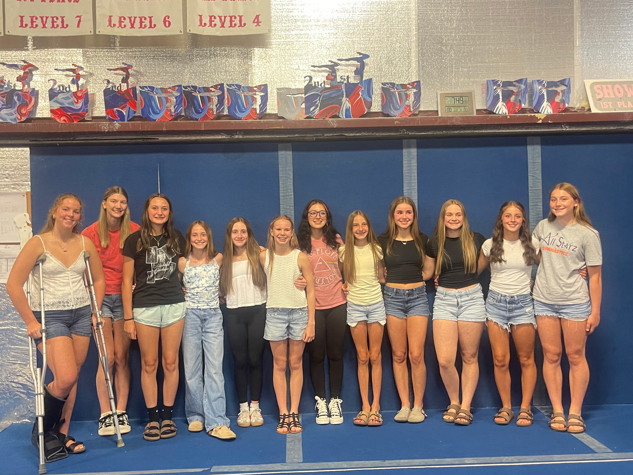 Young All Starz gymnast celebrating improvement