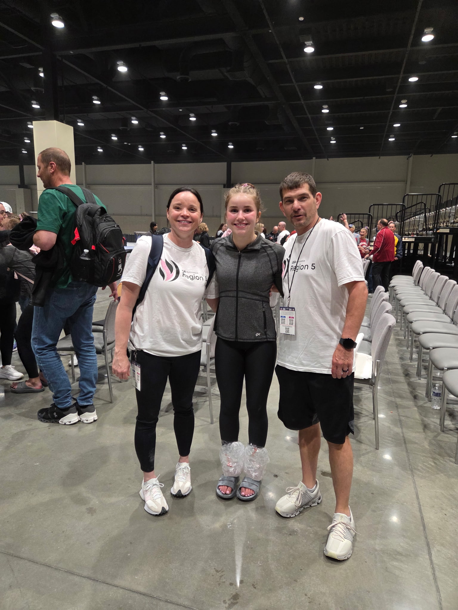 All Starz athlete with supportive coaches